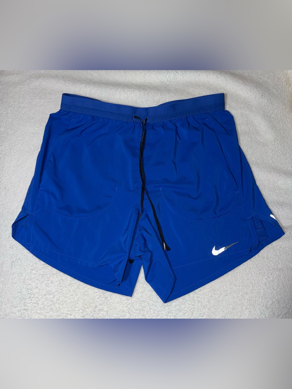 Nike Stride Dri-FIT running shorts in bright blue, size S